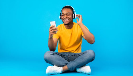 african-guy-listening-music-using-smartphone-weari-2021-09-03-07-41-56-utc.jpg